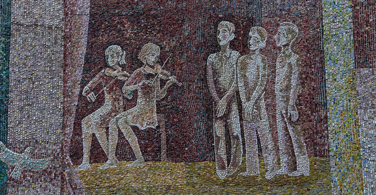 Questa figura mostra molte piccole tessere che creano un mosaico gigante